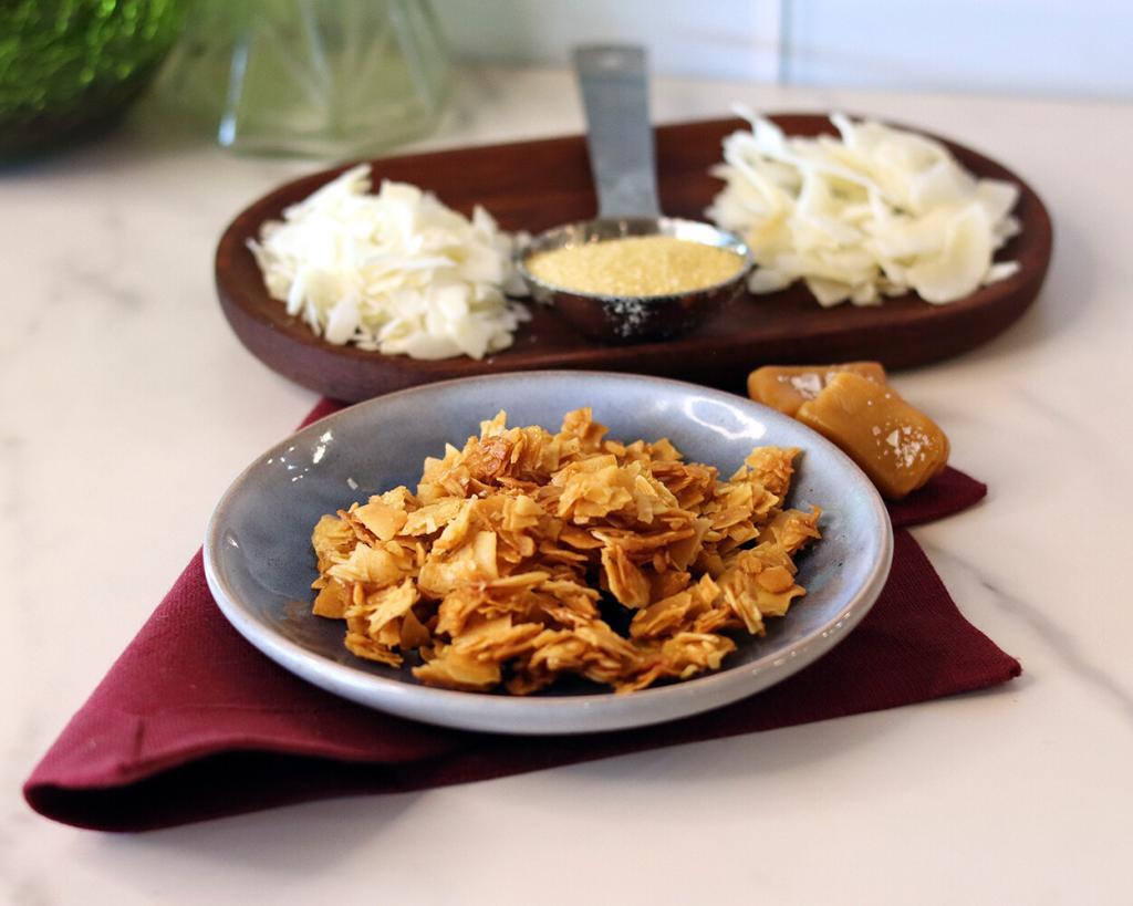 Sea Salt Caramel Coconut Chips on a small plate.