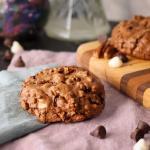 Chocolate Bliss Cookie on napkins in front of a serving board with more cookies.